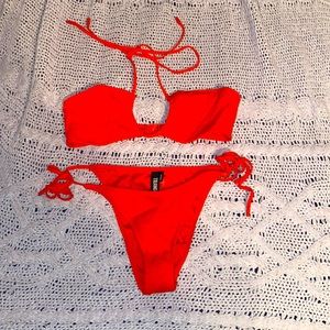 COPY - Triangl Bikini. Never worn. Selling top and bottom. Both size medium.